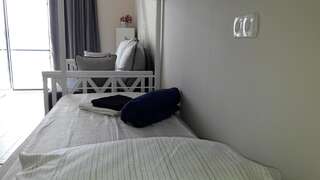 Хостелы 10 Fontana House Mykonos Одесса Четырехместный номер с видом на море-11