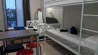 Хостелы 10 Fontana House Mykonos Одесса Четырехместный номер с видом на море-14